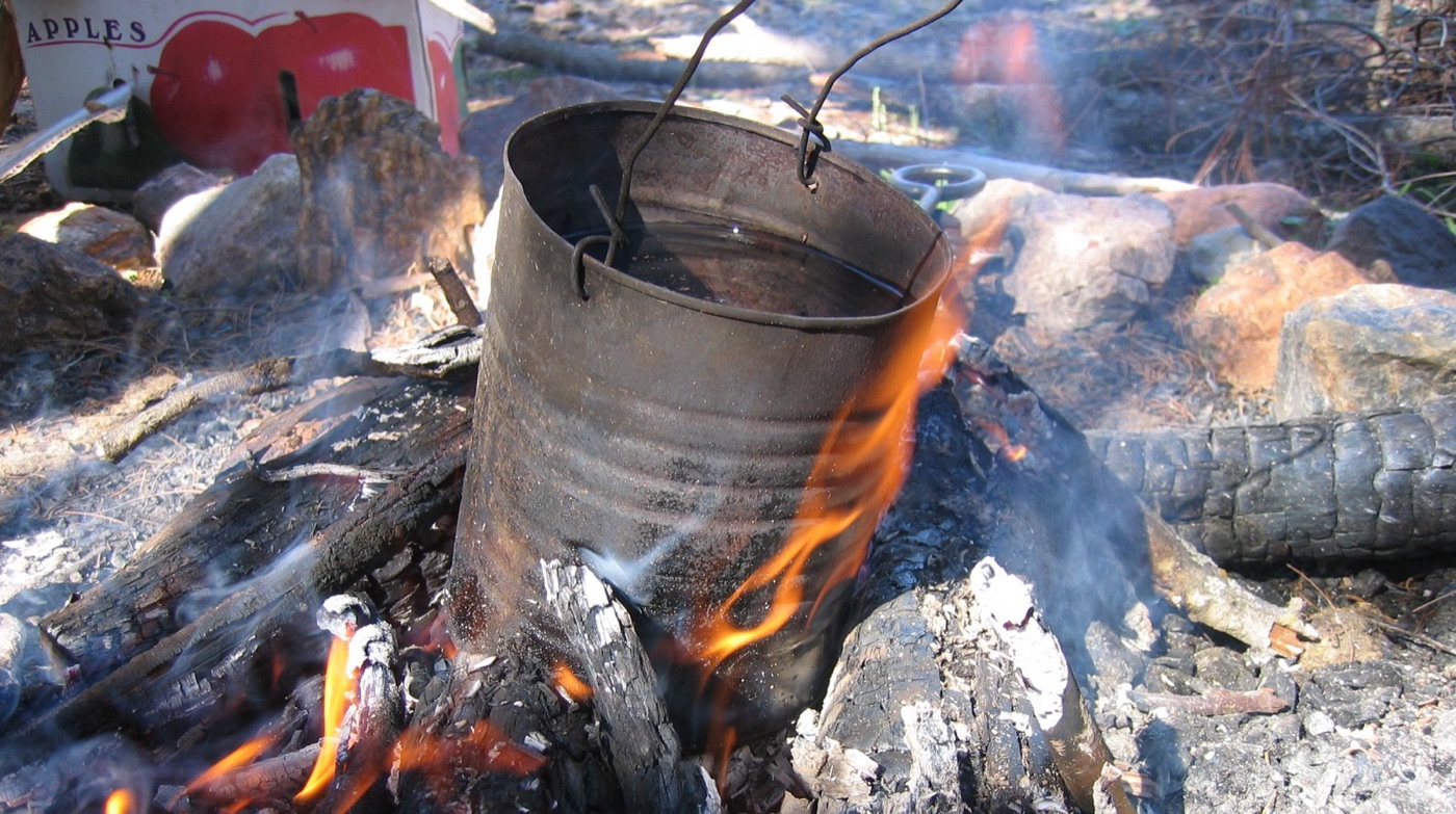 Boiling over a fire: the oldest treatment there is, and still the one most emergency advice relies on.