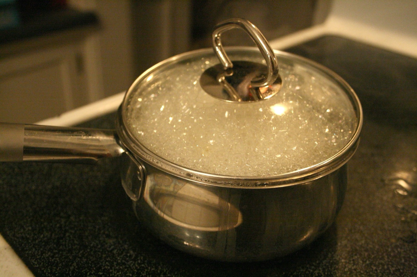 A rolling boil kills the organisms that make water unsafe. It leaves the salts and the metals exactly where they were.