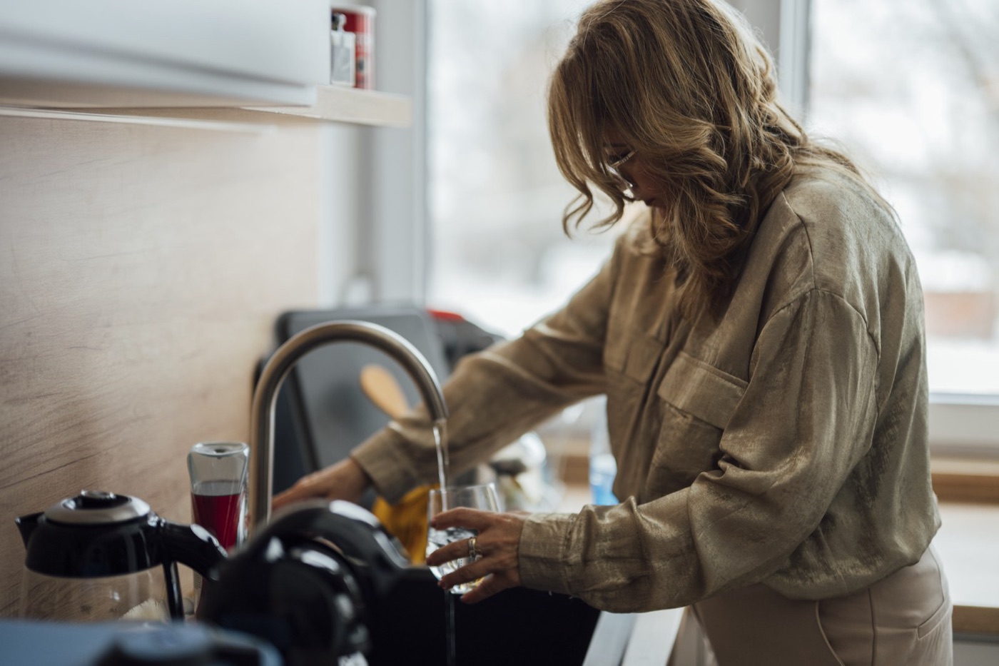 Washing up under a running tap: six to ten litres a minute, straight to the drain.