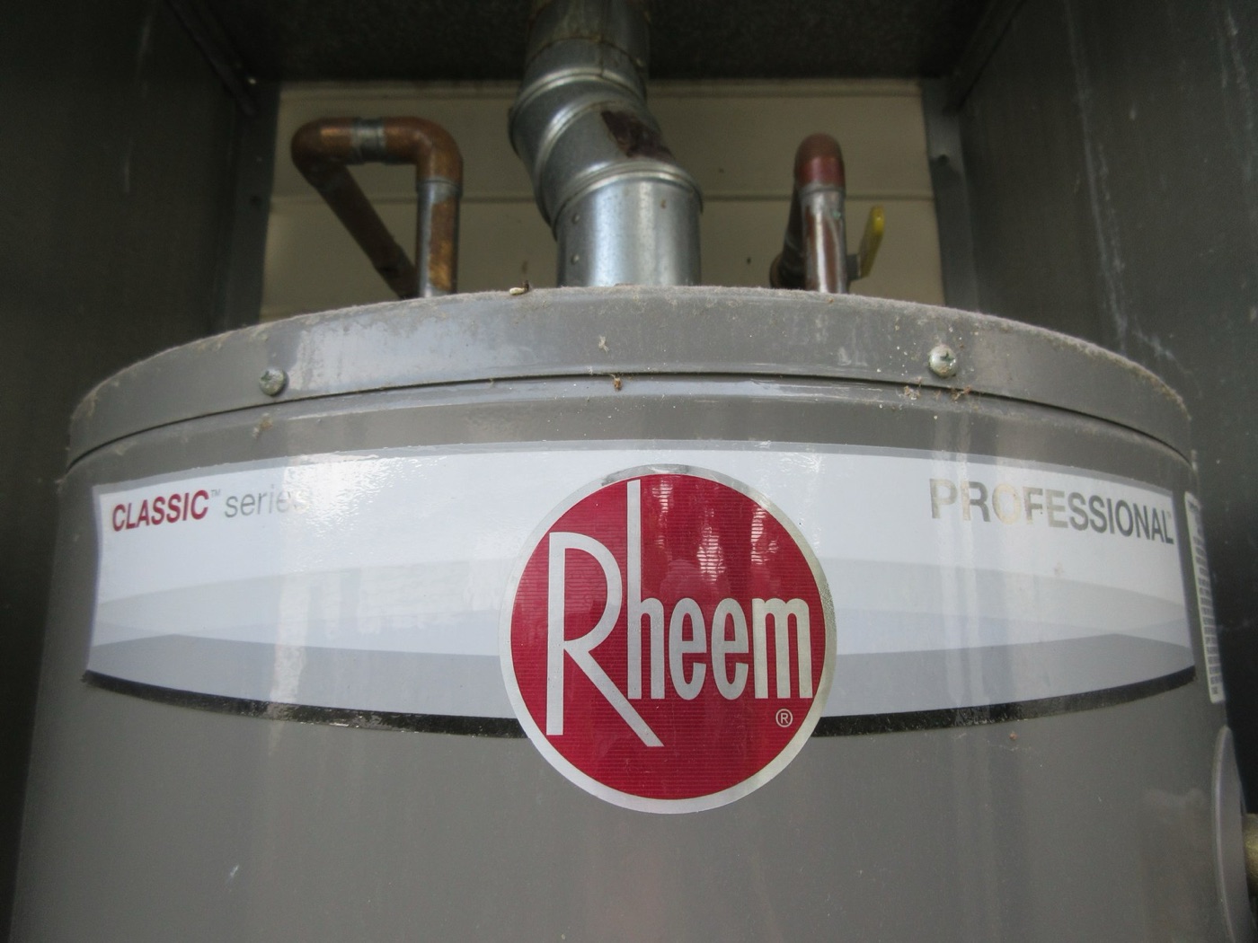 A domestic hot water tank. The water in it has sat for hours at sixty degrees in contact with the tank, its anode and every pipe to the tap.