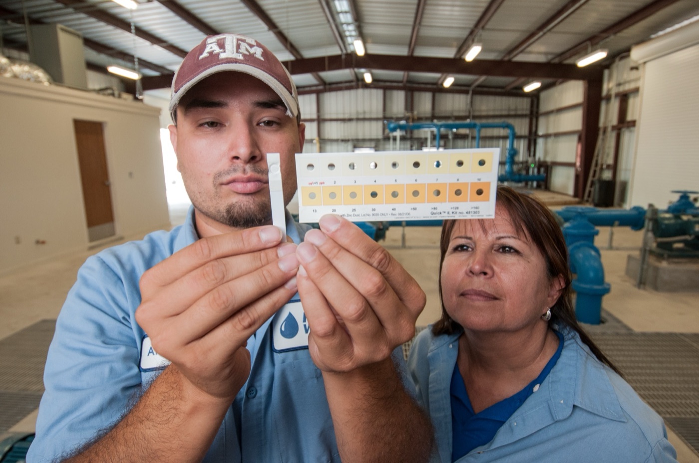 A test strip read at a small Texas utility. The newer methods need no laboratory, which is why small towns can run them.