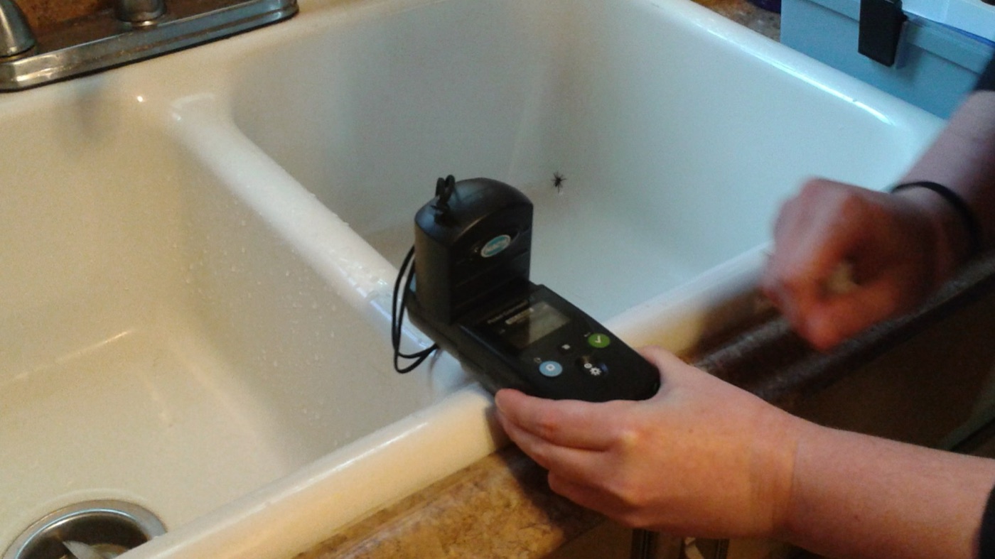 Testing tap water for lead in Flint. The reading depends on the last thirty metres of pipe.