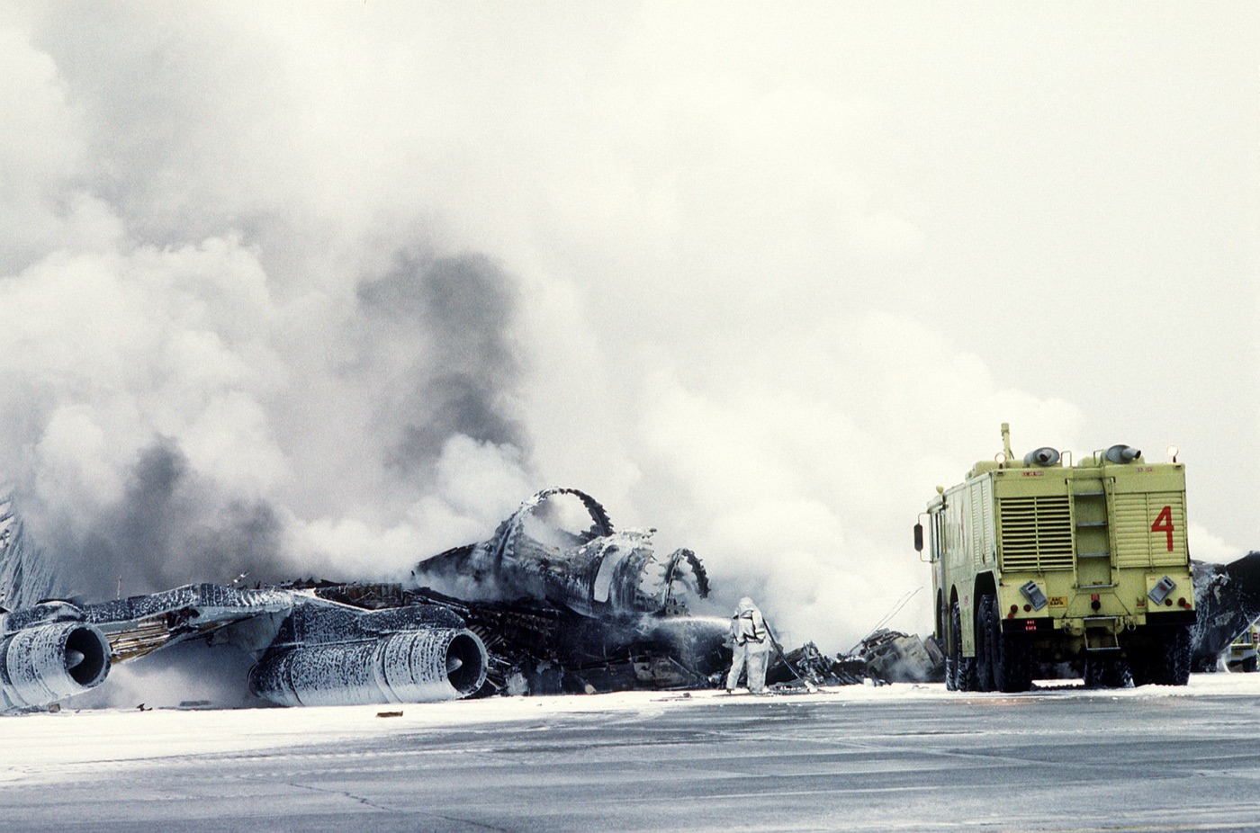 Firefighting foam sprayed on an aircraft. For decades the foam was made with PFAS, and around airfields it reached the wells.