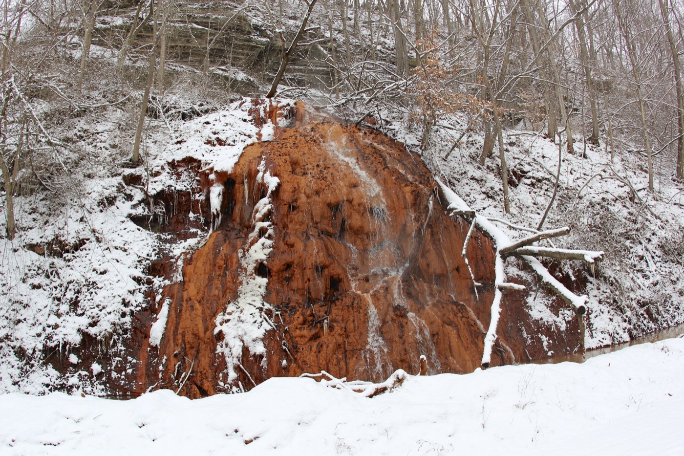 Acid mine drainage in Pennsylvania. Sulphide waste weathering to acid, and it runs for centuries after the mine closes.