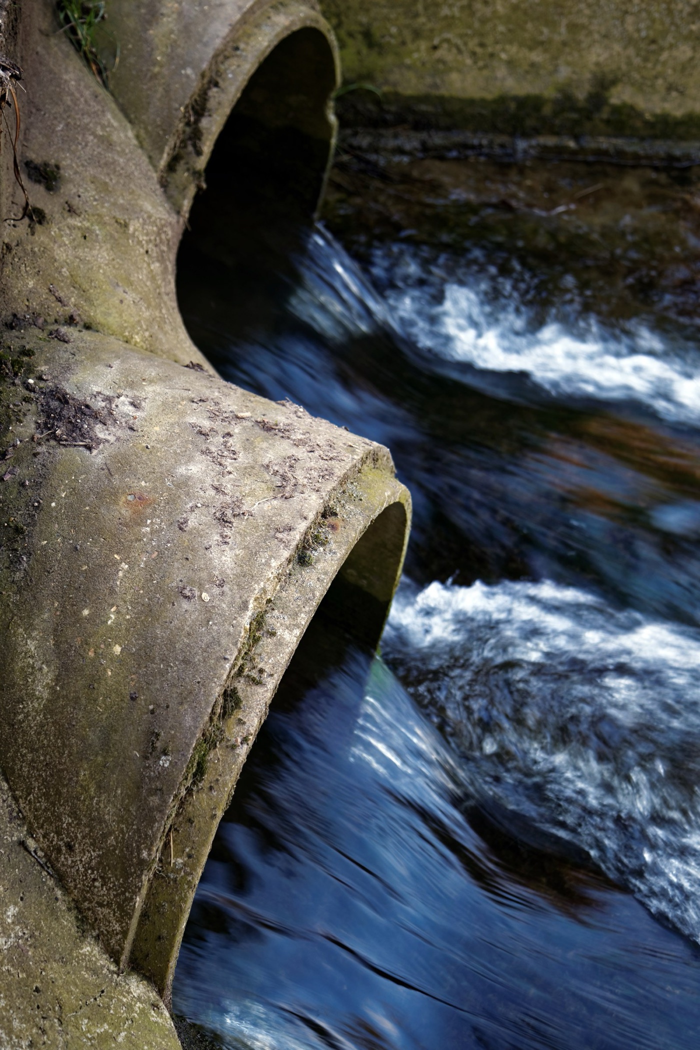An outfall pipe. Used water, treated or not, returns to the river through pipes like this one.