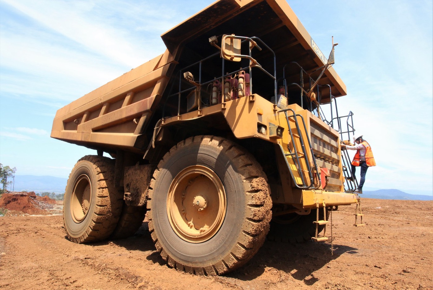 A haul truck at a nickel mine. The battery's other metals have ordinary mines' water, with tailings dams to match.