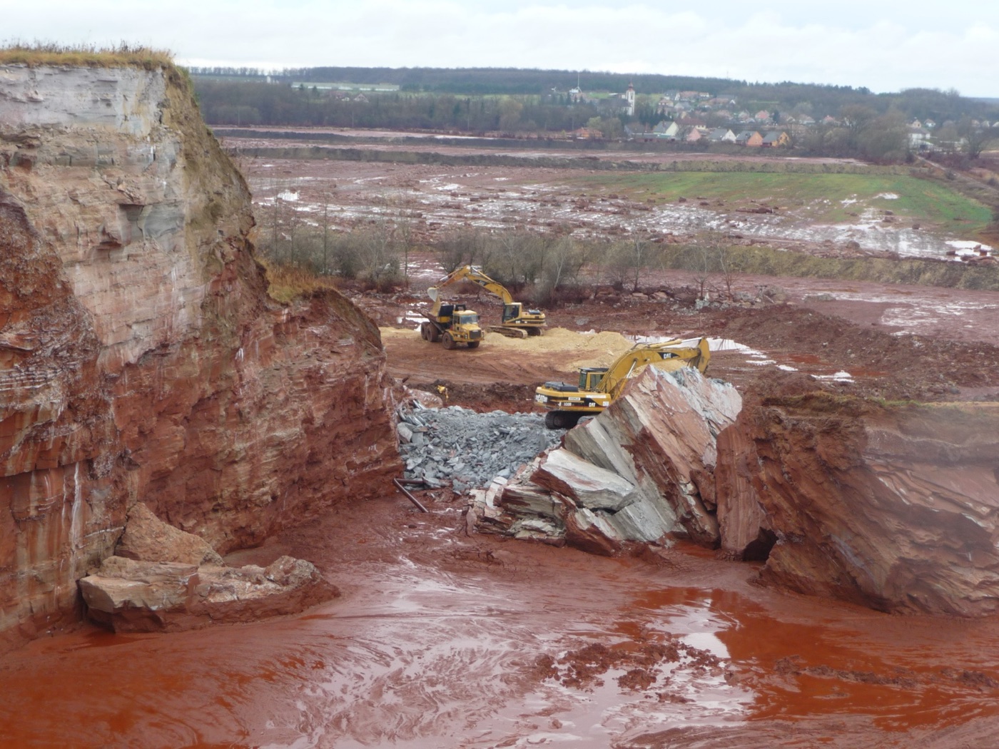 The breached corner of the Ajka pond. A million cubic metres of caustic mud went through it in minutes.
