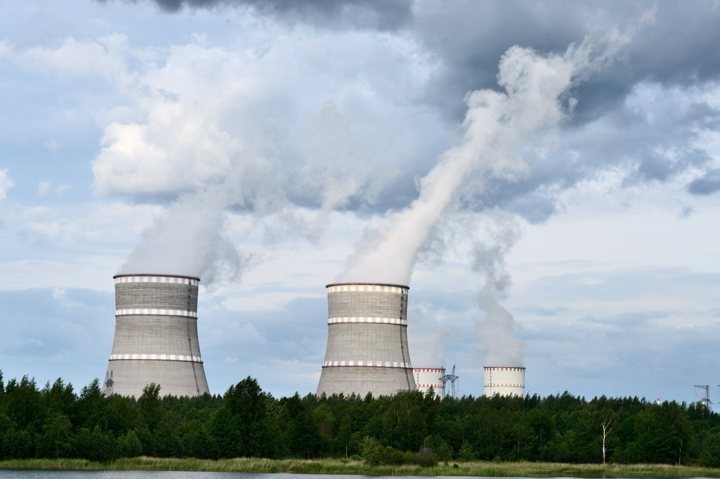 Cooling towers at a power station. The plume is water leaving as vapour, and a data centre's electricity was made here.