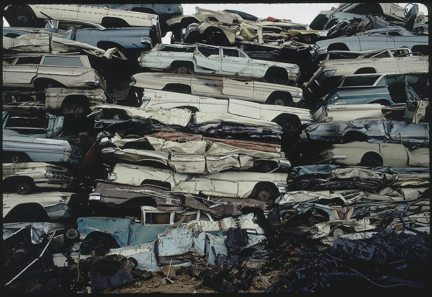 Crushed cars in a scrap yard. Steel from scrap uses a fraction of the water of steel from ore.