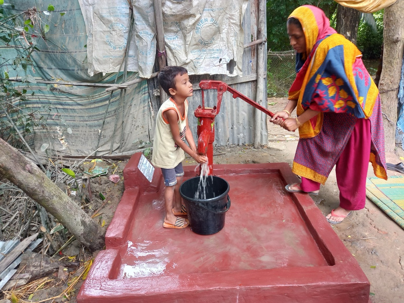 A hand pump on a tube well. The city has drilled deeper each year and the water table has followed.
