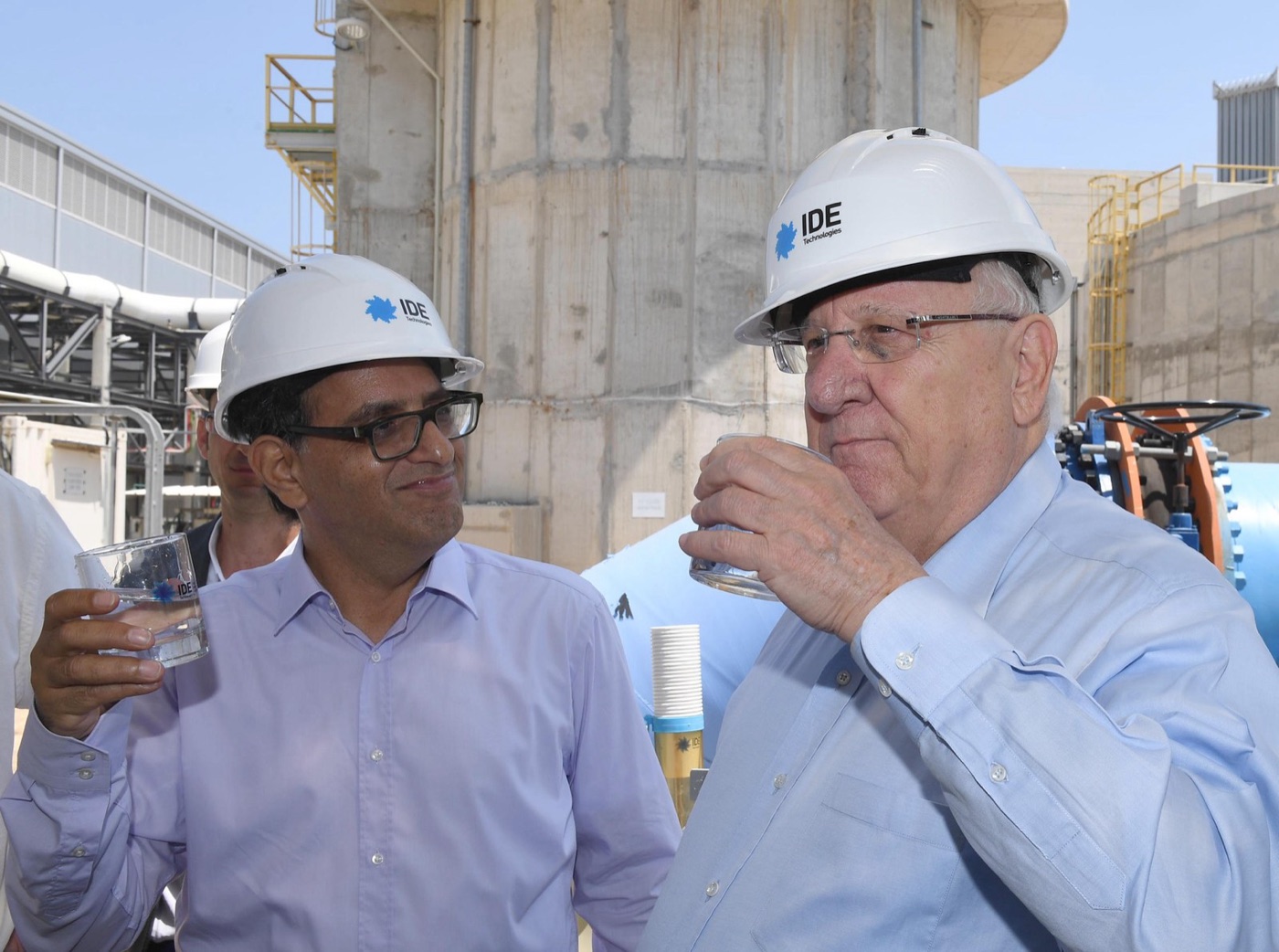 Israel's president, Reuven Rivlin, drinking desalinated water at the Sorek plant. Most of the country's tap water now starts in the sea.