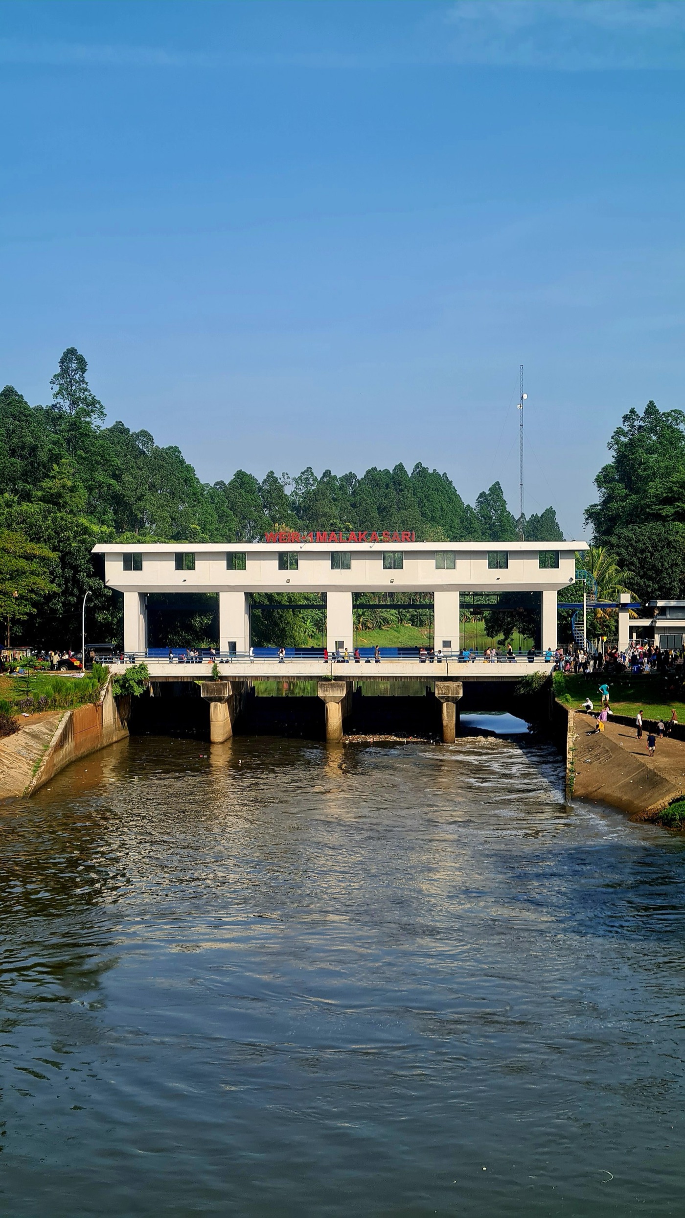 A sluice on a Jakarta canal. The rivers that once ran to the sea now have to be pumped.
