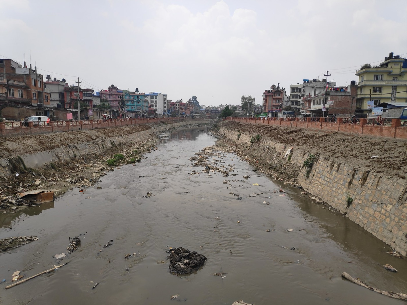 The Bagmati in the dry season, a river the city has made into a drain.