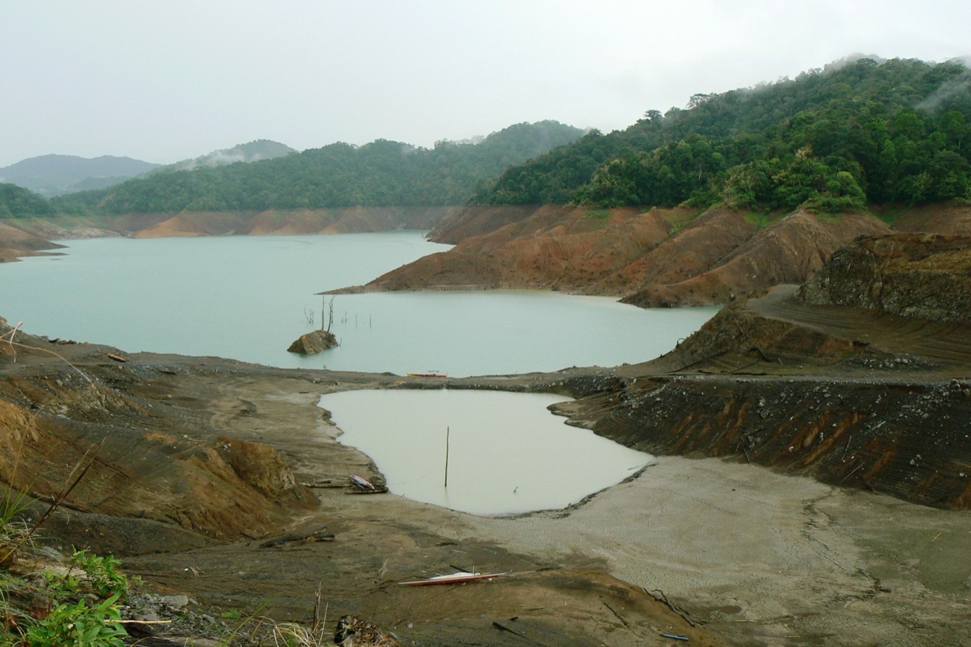 The Angat reservoir in May 2010, drawn down in an El Niño year, with the banks exposed.