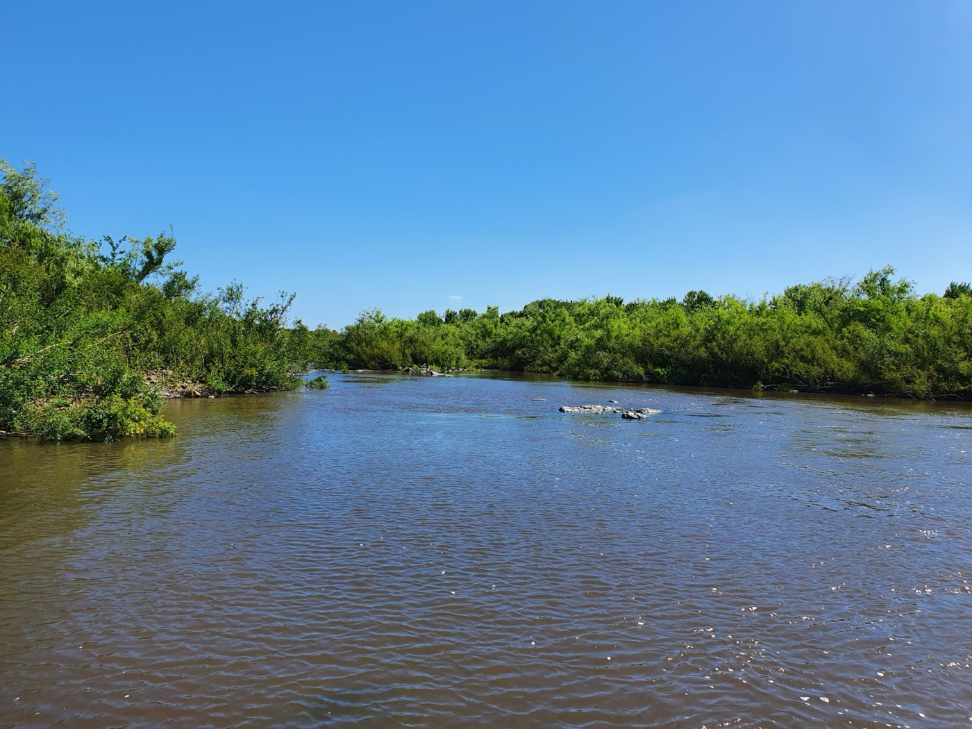 The Santa Lucía Chico at Paso Severino. The reservoir on it holds about sixty days of the capital's water and in June 2023 held almost none.
