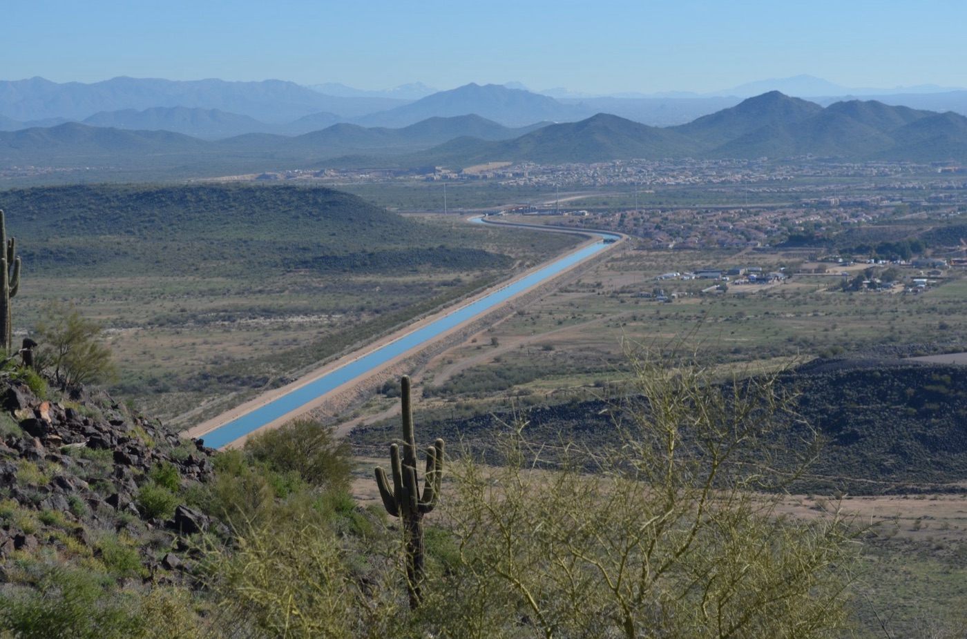 The Central Arizona Project canal crossing the desert. Colorado River water, lifted nine hundred metres.