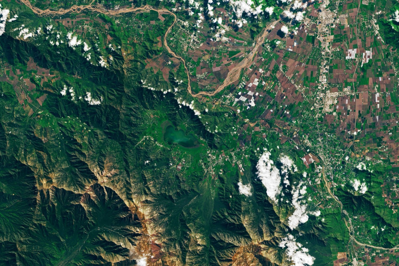 Laguna de Aculeo from orbit in 2023: the bed of a twelve square kilometre lake that dried in 2018 while every water right on it was exercised.