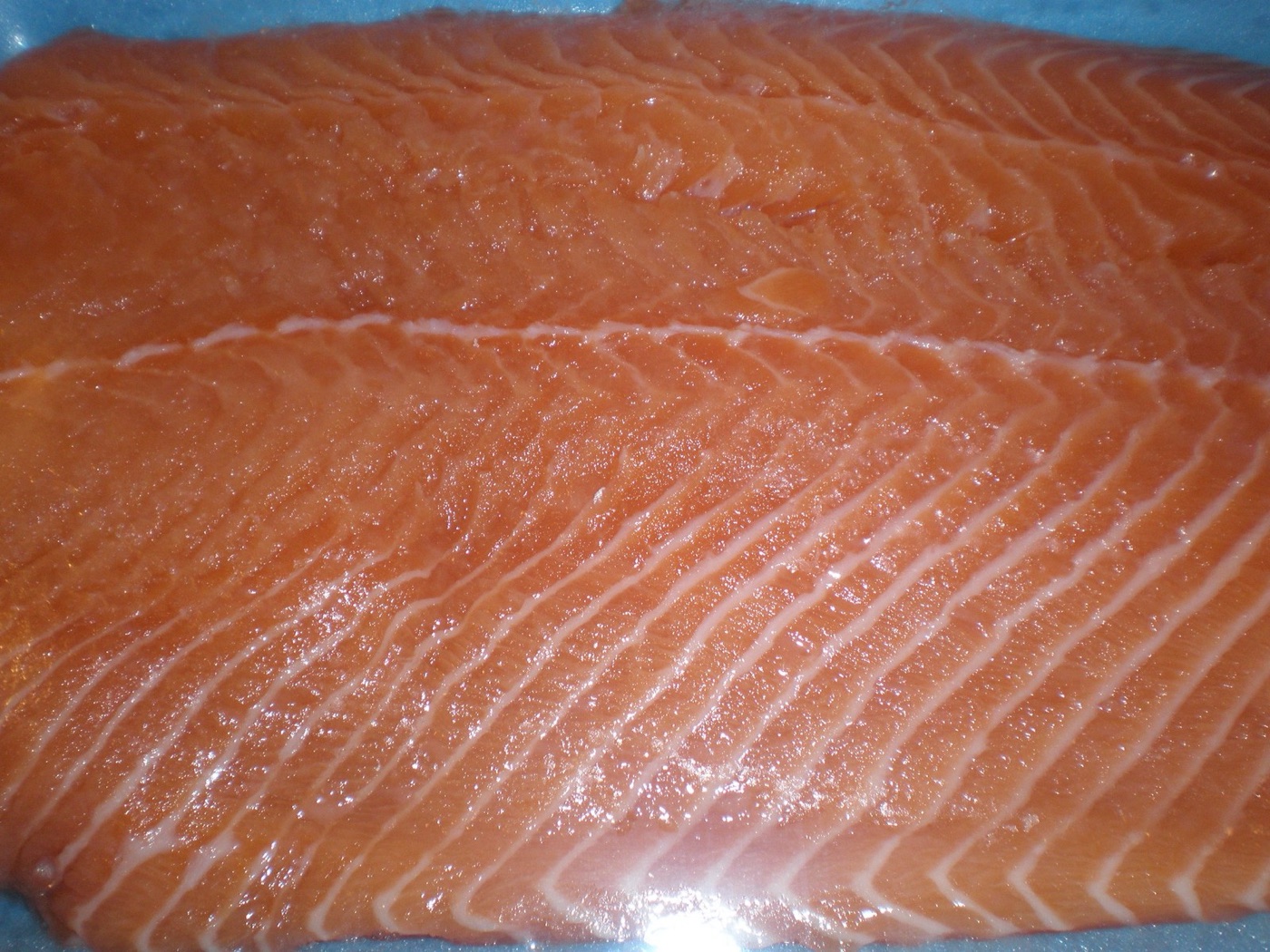 A kilogram of salmon carries about two thousand litres, nearly all of it in the crops that went into the feed.